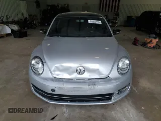 2012 Volkswagen Beetle with VIN 3VWV67AT1CM663839, listed as a Copart auction lot 55009455 with 122,042 mi miles and Salvage Title. Bid and sale history available at DreamBid. Image 5.