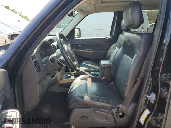 2011 Jeep Liberty Limited 70th Anniversary with VIN 1J4PN5GK0BW569476, listed as a Copart auction lot 53065455 with 138,512 mi miles and Salvage Title. Bid and sale history available at DreamBid. Image 7.