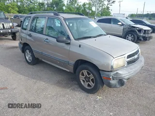 2003 Chevrolet Tracker z VIN 2CNBJ13C436944408, wystawiony jako IAAI lot #42362880 z przebiegiem 213 813 mil mil oraz . Historia ofert i sprzedaży dostępna na DreamBid. Obrazek 1.
