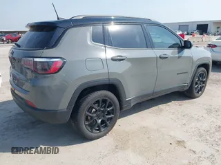 2023 Jeep Compass Latitude with VIN 3C4NJDBN6PT531767, listed as a IAAI auction lot 42254833 with 57,630 mi miles and . Bid and sale history available at DreamBid. Image 4.