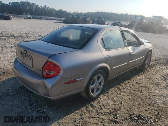 2001 Nissan Maxima GXE z VIN JN1CA31D11T828767, wystawiony jako Copart lot #69504024 z przebiegiem 177 431 mil mil oraz Szkoda całkowita • Salvage title. Historia ofert i sprzedaży dostępna na DreamBid. Obrazek 3.