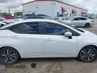 2021 Nissan Versa SV with VIN 3N1CN8EV0ML867668, listed as a IAAI auction lot 42315666 with 73,024 mi miles and . Bid and sale history available at DreamBid. Image 12.