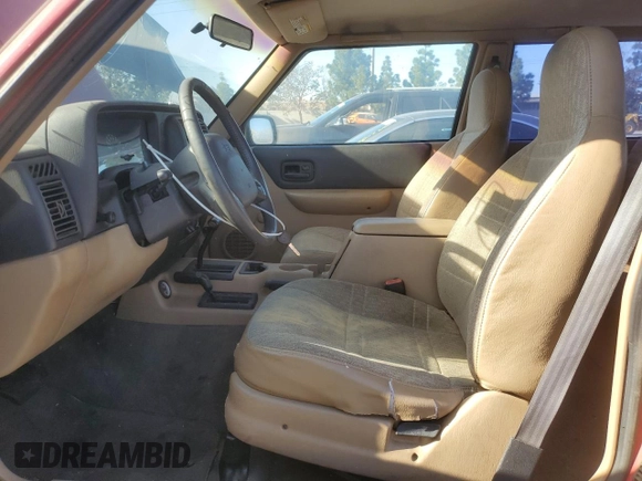 2000 Jeep Cherokee SE with VIN 1J4FF27S8YL173099, listed as a Copart auction lot 86200574 with 204,394 mi miles and Clean title. Bid and sale history available at DreamBid. Image 7.