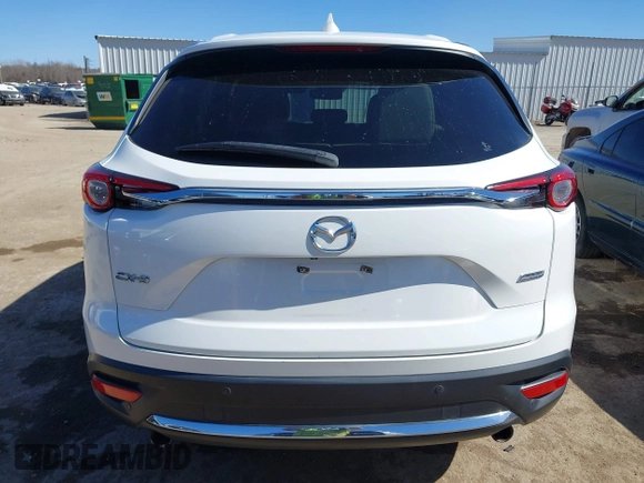 2018 Mazda CX-9 Grand Touring with VIN JM3TCADY6J0229768, listed as a IAAI auction lot 41724072 with 80,918 mi miles and . Bid and sale history available at DreamBid. Image 17.