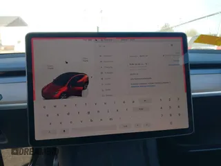 2023 Tesla Model Y Long Range with VIN 7SAYGDEE3PA114256, listed as a IAAI auction lot 42158307 with 19,975 mi miles and . Bid and sale history available at DreamBid. Image 7.
