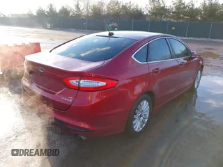 2015 Ford Fusion SE Hybrid with VIN 3FA6P0LUXFR282022, listed as a IAAI auction lot 41652820 with 210,865 mi miles. Bid and sale history available at carsss.com. Image 4.