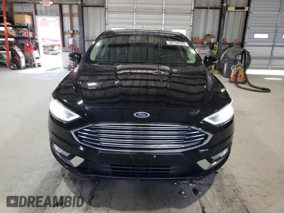 2018 Ford Fusion Titanium с VIN 3FA6P0D9XJR241506, выставлен на аукционе Copart как лот 60736525 с пробегом 109 548 миль миль и Списание • Salvage title. История ставок и продаж доступна на DreamBid. Изображение 5.