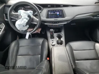2020 Cadillac XT4 FWD Sport with VIN 1GYFZER40LF012664, listed as a Copart auction lot 54797915 with 59,393 mi miles and Salvage title. Bid and sale history available at DreamBid. Image 8.