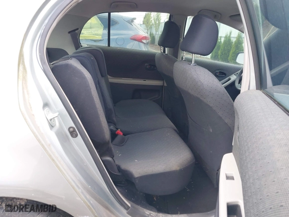 2009 Toyota Yaris with VIN JTDKT903295237216, listed as a IAAI auction lot 42087676 with 158,341 mi miles. Bid and sale history available at carsss.com. Image 8.