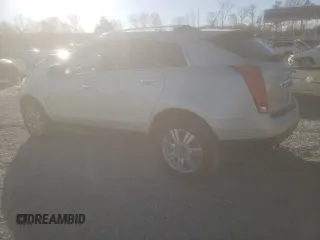 2014 Cadillac SRX Luxury Collection z VIN 3GYFNBE38ES516403, wystawiony jako Copart lot #49645375 z przebiegiem 143 769 mil mil oraz Szkody całkowita. Historia ofert i sprzedaży dostępna na DreamBid. Obrazek 2.