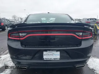 2022 Dodge Charger SXT with VIN 2C3CDXBG0NH157720, listed as a IAAI auction lot 41559731 with 21,062 mi miles and . Bid and sale history available at carsss.com. Image 16.