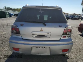 2006 Mitsubishi Outlander SE with VIN JA4LX41F66U025242, listed as a Copart auction lot 77124974 with 163,848 mi miles and Salvage Title. Bid and sale history available at carsss.com. Image 6.