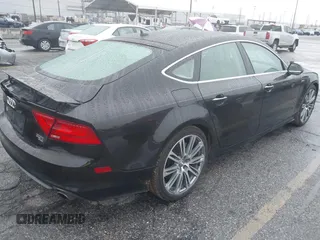 2014 Audi A7 3.0 Prestige with VIN WAU2GAFC5EN090233, listed as a IAAI auction lot 41565942 with 199,890 mi miles. Bid and sale history available at carsss.com. Image 4.