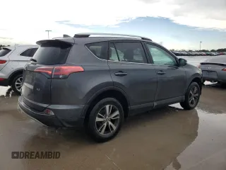 2018 Toyota RAV4 XLE with VIN 2T3WFREV6JW411935, listed as a Copart auction lot 54218405 with 123,831 mi miles and Salvage title. Bid and sale history available at DreamBid. Image 3.