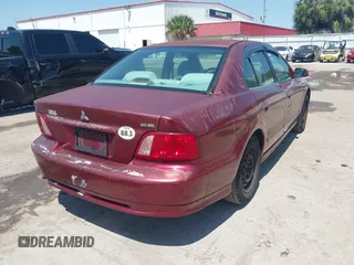 2003 Mitsubishi Galant ES z VIN 4A3AA46G83E216938, wystawiony jako IAAI lot #42191226 z przebiegiem Nie podano mil oraz . Historia ofert i sprzedaży dostępna na DreamBid. Obrazek 4.