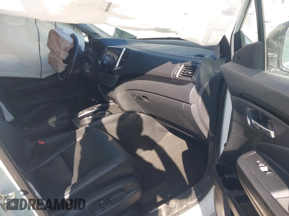 2016 Honda Pilot Elite with VIN 5FNYF6H05GB019292, listed as a IAAI auction lot 41668830 with 170,718 mi miles. Bid and sale history available at carsss.com. Image 5.