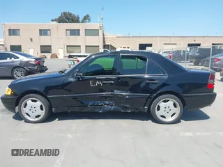 1999 Mercedes-Benz C with VIN WDBHA33G3XF889442, listed as a IAAI auction lot 42403800 with 82,075 mi miles and . Bid and sale history available at DreamBid. Image 14.