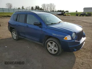 2010 Jeep Compass North Edition with VIN 1J4NF4FB2AD575774, listed as a Copart auction lot 52617805 with 130,645 mi miles and Clean Title. Bid and sale history available at carsss.com. Image 4.