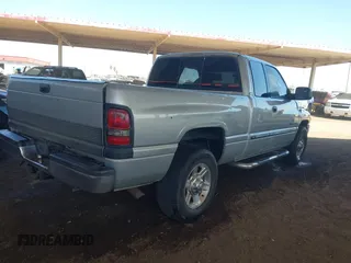 2000 Dodge Ram 2500 with VIN 3B7KC23Z0YG115131, listed as a IAAI auction lot 41993813 with 162,538 mi miles. Bid and sale history available at carsss.com. Image 4.