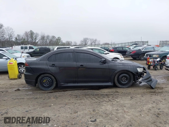 2010 Mitsubishi Lancer Evolution GSR with VIN JA32W8FV1AU012725, listed as a IAAI auction lot 41542629 with 124,347 mi miles and . Bid and sale history available at DreamBid. Image 13.