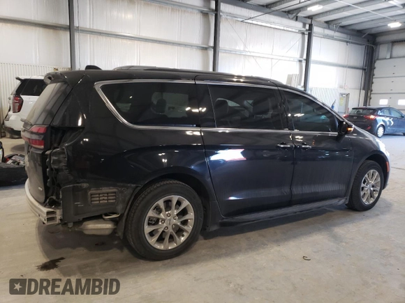 2021 Chrysler Pacifica Touring L with VIN 2C4RC3BG4MR573571, listed as a Copart auction lot 89388215 with 50,969 mi miles and Salvage title. Bid and sale history available at DreamBid. Image 3.