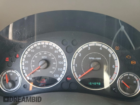 2005 Jeep Liberty Limited with VIN 1J8GL58K95W508943, listed as a Copart auction lot 56567015 with 164,898 mi miles and Salvage title. Bid and sale history available at DreamBid. Image 9.