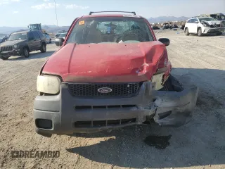 2001 Ford Escape XLS with VIN 1FMYU02161KE97828, listed as a Copart auction lot 62542154 with 186,810 mi miles and Salvage Title. Bid and sale history available at carsss.com. Image 5.