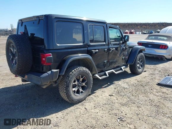 2018 Jeep Wrangler Unlimited Rubicon with VIN 1C4HJXFGXJW255881, listed as a IAAI auction lot 42316499 with 39,439 mi miles and . Bid and sale history available at DreamBid. Image 4.
