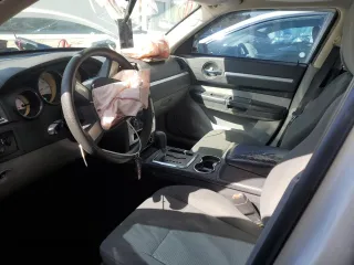 2010 Dodge Charger SXT with VIN 2B3CA3CV7AH106818, listed as a Copart auction lot 45035325 with 166,445 mi miles and Salvage Title. Bid and sale history available at carsss.com. Image 7.