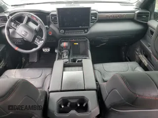 2024 Toyota Tundra TRD Pro Hybrid with VIN 5TFPC5DB6RX076616, listed as a Copart auction lot 43985855 with 7,273 mi miles and Salvage title. Bid and sale history available at DreamBid. Image 8.