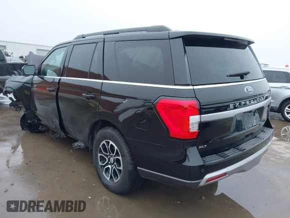2023 Ford Expedition XLT with VIN 1FMJU1H86PEA14891, listed as a IAAI auction lot 41514898 with 56,592 mi miles. Bid and sale history available at carsss.com. Image 3.