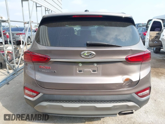 2020 Hyundai Santa Fe SE with VIN 5NMS23AD6LH220012, listed as a IAAI auction lot 42317046 with 141,055 mi miles and . Bid and sale history available at DreamBid. Image 16.