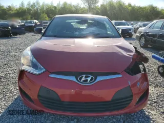 2014 Hyundai Veloster z VIN KMHTC6AD8EU213234, wystawiony jako Copart lot #53297535 z przebiegiem 131 769 mil mil oraz Szkoda całkowita • Salvage title. Historia ofert i sprzedaży dostępna na DreamBid. Obrazek 5.