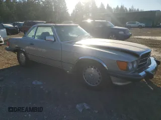 1987 Mercedes-Benz 560 SL with VIN WDBBA48D6HA057618, listed as a Copart auction lot 43252525 with 86,855 mi miles and Salvage Title. Bid and sale history available at DreamBid. Image 4.