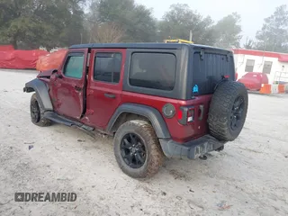 2021 Jeep Wrangler Unlimited Willys with VIN 1C4HJXDN6MW815448, listed as a IAAI auction lot 41459304 with 52,474 mi miles and . Bid and sale history available at DreamBid. Image 3.