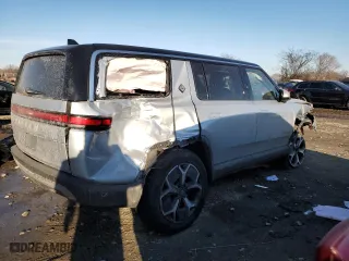 2023 Rivian R1S Adventure with VIN 7PDSGABAXPN008547, listed as a Copart auction lot 89061955 with 24,454 mi miles and Salvage Title. Bid and sale history available at carsss.com. Image 3.