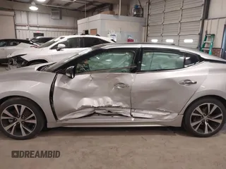 2018 Nissan Maxima SV with VIN 1N4AA6APXJC367526, listed as a IAAI auction lot 41427841 with 113,533 mi miles and . Bid and sale history available at DreamBid. Image 13.