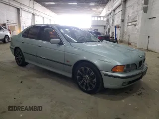 1998 BMW 5 Series 528iA with VIN WBADD6328WBW40098, listed as a Copart auction lot 52914675 with 249,562 mi miles and Salvage Title. Bid and sale history available at carsss.com. Image 4.