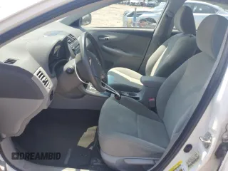 2010 Toyota Corolla with VIN 1NXBU4EE6AZ306666, listed as a Copart auction lot 58370215 with 128,586 mi miles and Salvage title. Bid and sale history available at DreamBid. Image 7.