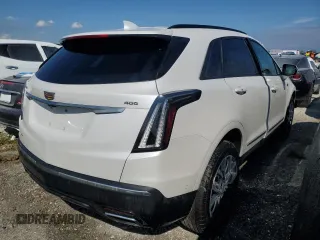 2023 Cadillac XT5 AWD Sport with VIN 1GYKNGRS4PZ191199, listed as a Copart auction lot 74790394 with 17,281 mi miles and Non repairable. Bid and sale history available at DreamBid. Image 3.
