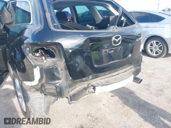 2010 Mazda CX-7 Sport with VIN JM3ER2W51A0310645, listed as a IAAI auction lot 41948890 with 139,777 mi miles. Bid and sale history available at carsss.com. Image 6.
