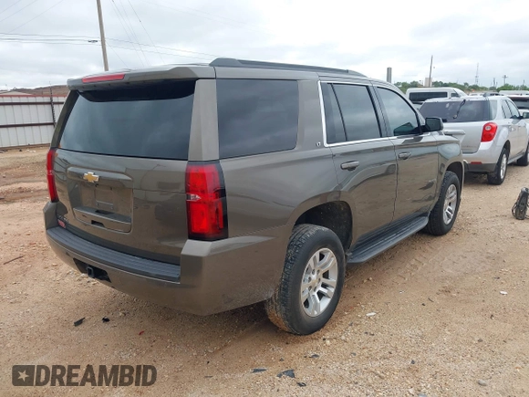 2015 Chevrolet Tahoe LT z VIN 1GNSCBKC2FR685780, wystawiony jako IAAI lot #42354130 z przebiegiem 101 617 mil mil oraz . Historia ofert i sprzedaży dostępna na DreamBid. Obrazek 4.