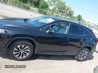 2021 Lexus RX with VIN 2T2AZMAA2MC196524, listed as a IAAI auction lot 42017362 with 80,922 mi miles. Bid and sale history available at carsss.com. Image 14.