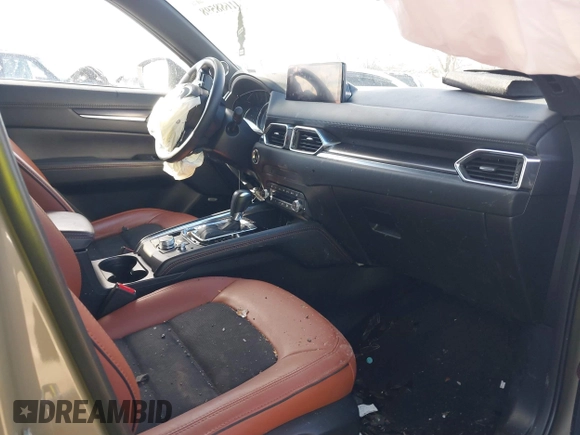 2024 Mazda CX-5 Carbon Edition with VIN JM3KFBAYXR0371954, listed as a IAAI auction lot 41688598 with 13,230 mi miles and . Bid and sale history available at DreamBid. Image 5.
