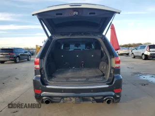 2012 Jeep Grand Cherokee SRT8 with VIN 1C4RJFDJ9CC346867, listed as a Copart auction lot 86349154 with 125,130 mi miles and Salvage Title. Bid and sale history available at carsss.com. Image 6.