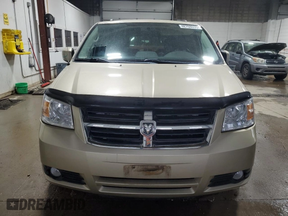2010 Dodge Grand Caravan Crew with VIN 2D4RN6DX7AR463122, listed as a Copart auction lot 48768635 with 102,497 mi miles and Salvage Title. Bid and sale history available at DreamBid. Image 5.