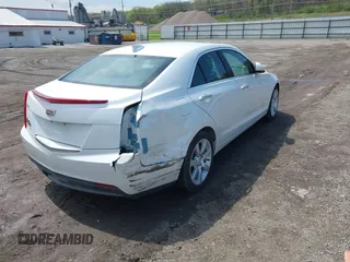 2016 Cadillac ATS Standard RWD with VIN 1G6AA5RA4G0110279, listed as a IAAI auction lot 42078659 with 72,085 mi miles and . Bid and sale history available at DreamBid. Image 4.