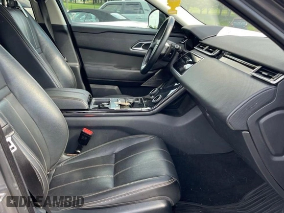 2018 Land Rover Range Rover Velar S z VIN SALYB2RX1JA778174, wystawiony jako Copart lot #59567875 z przebiegiem 74 406 mil mil oraz Czysty tytuł • Clean title. Historia ofert i sprzedaży dostępna na DreamBid. Obrazek 5.