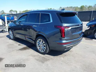 2021 Cadillac XT6 Premium Luxury with VIN 1GYKPERS0MZ110029, listed as a IAAI auction lot 41669104 with 58,890 mi miles and . Bid and sale history available at DreamBid. Image 3.
