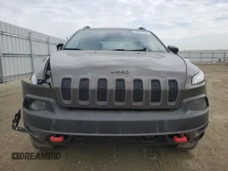 2015 Jeep Cherokee Trailhawk with VIN 1C4PJMBS0FW678738, listed as a Copart auction lot 50651235 with 147,793 mi miles and Salvage title. Bid and sale history available at DreamBid. Image 5.